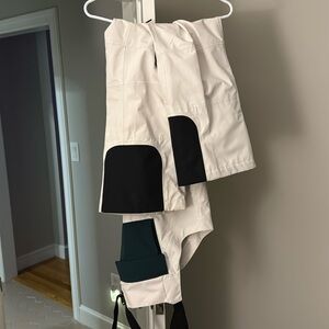 White and forest green North face dragline, bibs size medium